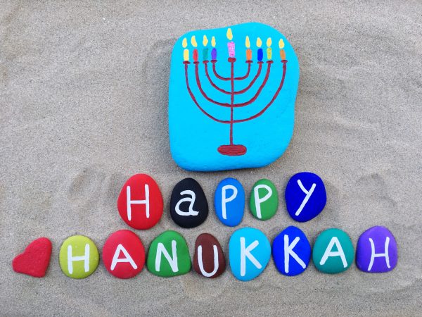 happy-hanukkah-composed-with-colored-stone-letters-37NJ3NQ