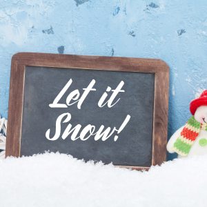 Christmas eCard with a small snowman and a chalkboard that says Let It Snow